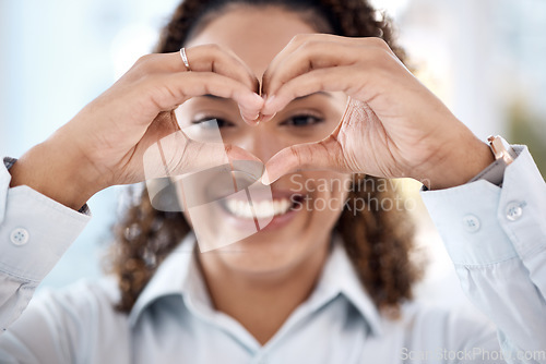 Image of Portrait, hands and heart with woman, smile and joyful for growth, peace and cheerful for development. Female, girl and sign for love, happiness and global support for health, wellness and humanity