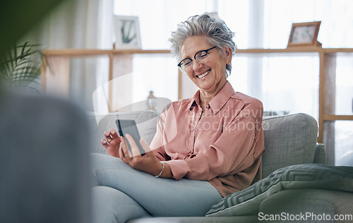 Image of Elderly woman with smartphone, communication and relax at home, social media and happy with technology. Retirement, internet and chat online with wifi, happiness with reading ebook or news on website