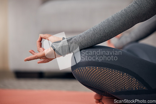 Image of Closeup hands, yoga and meditation for woman on home floor for wellness, health and fitness of body. Elderly lady, workout and training in living room for healthy muscle, relax and calm mindfulness