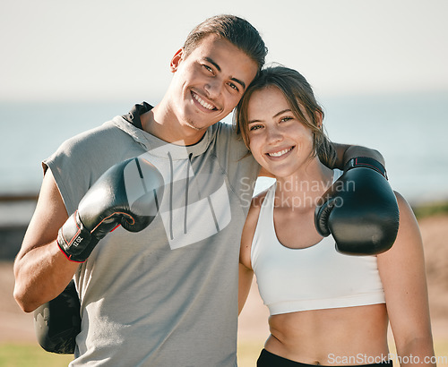 Image of Couple, fitness and boxing exercise portrait outdoor in nature park for health and wellness. Woman and personal trainer happy about sports workout or mma training with motivation, energy and coaching