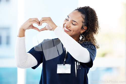 Image of Doctor, volunteer or heart hands in hospital wellness, medicine trust or medical support in life insurance, help or vote. Smile, happy or nurse and love gesture in healthcare, emoji or woman security