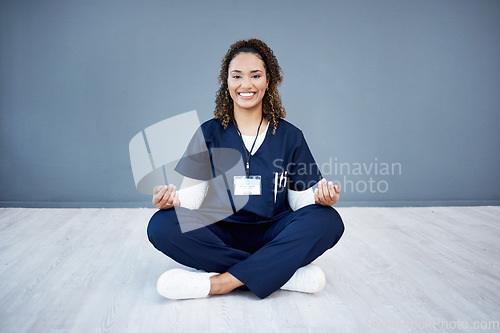 Image of Nurse, portrait or sitting meditation on hospital mockup, clinic mock up or wall for mental health, peace or chakra healthcare. Smile, happy or woman doctor in meditate pose for zen mindset or relax