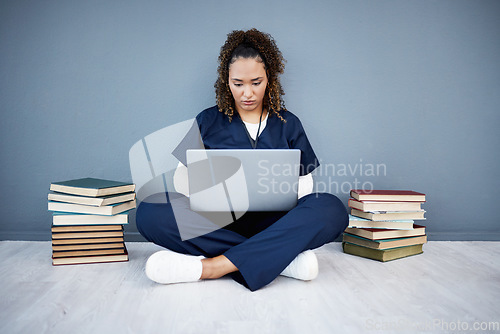 Image of Nurse, laptop or typing in hospital research, wellness books study or education in medicine scholarship on mockup wall. Medical student, woman or healthcare technology for worker research internship