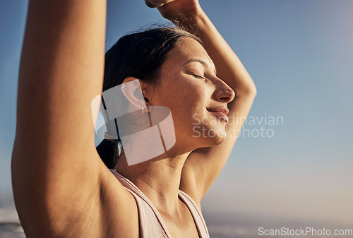 Image of Yoga, woman and blue sky meditation in nature outdoor for fitness, training and workout. Happy model person with exercise for zen, peace and holistic time for health and wellness with beach pilates