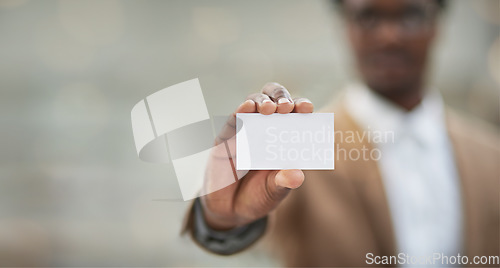 Image of Logo, man and business card for networking, opportunity and sales growth with mockup, space and ceo. Male, hand and leader with brand development, black paper and design for company and branding