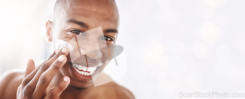 Image of Black man, skincare portrait and cream by mockup space, smile or happy for cosmetic beauty by blurred background. African gen z model, skin health and natural glow with product placement mock up