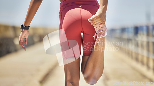 Image of Closeup, back and black woman stretching legs, training and exercise for wellness, healthy lifestyle and fitness. Zoom, female athlete and lady stretch leg, practice and outdoor for workout or energy