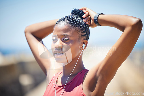 Image of Black woman, break and breathing outdoor for fitness, healthy target and body fatigue. Female athlete, breathe and thinking of sports workout, exercise mindset and music earphones of runner challenge