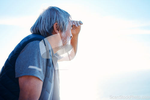 Image of Search, looking and mature man in nature for hiking, travel and holiday to relax on a blue sky. Environment, exercise and elderly Asian person searching on an adventure during a vacation with mockup
