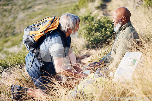 Image of First aid, knee pain and hiking with senior friends in nature for trekking, adventure and fitness. Help, bandage and medical with old men and injury on trail for backpacking, discovery and emergency