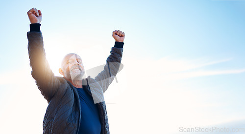 Image of Success, hiking and portrait of man in nature for travel, fitness and freedom in Norway. Excited, motivation and mature person with celebration, achievement and climbing win on a blue sky with mockup