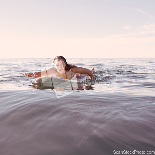 Image of Surfing, woman and portrait in waves, sea and ocean for summer adventure, freedom and sky mockup in Australia. Female surfer, board and swimming in water, beach and relax for tropical holiday travel