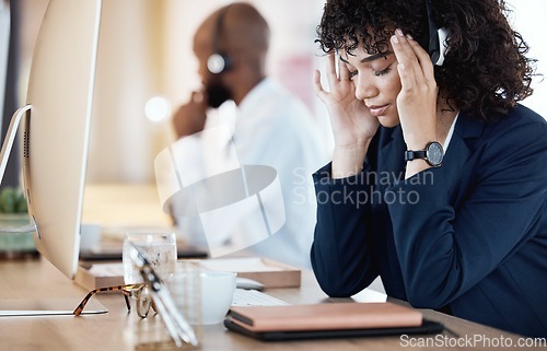 Image of Mental health, depression and businesswoman or call center agent frustrated and sad in an office. Headache, pain and nausea by customer service worker, employee or consultant feeling depressed