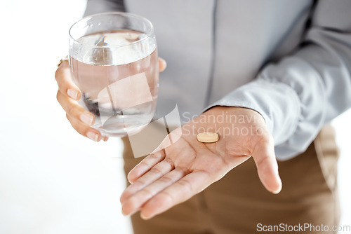 Image of Pills, water glass and woman hands for mental health, depression or medical problem in pharmaceutical industry. Medicine, tablet or healthcare drugs of person anxiety, headache and stress management