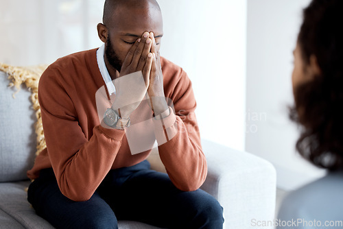 Image of Black man, mental health and depression counseling and psychologist, stress headache and help. Psychology consultation, woman doctor with depressed patient and conversation about anxiety problem
