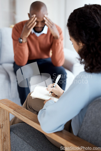 Image of Woman psychologist writing, black man in therapy with mental health, stress headache and depressed with help. Consultation, doctor report on patient diagnosis, anxiety problem and sad with depression