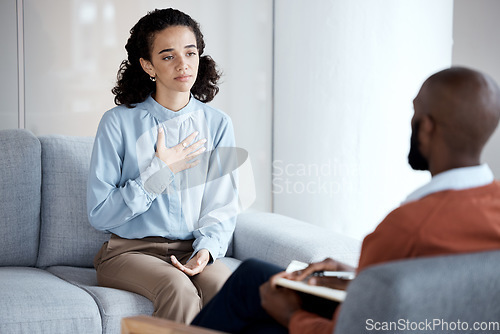 Image of Conversation, sad and woman with a psychologist for therapy, trauma and mental health support. Consultation, psychology and patient talking to a black man during counseling about a life problem