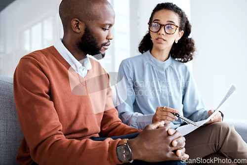 Image of Contract, healthcare agreement and black man with woman explain paperwork, health insurance and legal document. Discussion, doctor in psychology and patient in consultation, sign terms and conditions