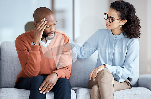 Image of Therapy, counselling and mental health support for black man patient on psychologist couch. Person talking to woman therapist about psychology, anxiety and depression or stress for help or support