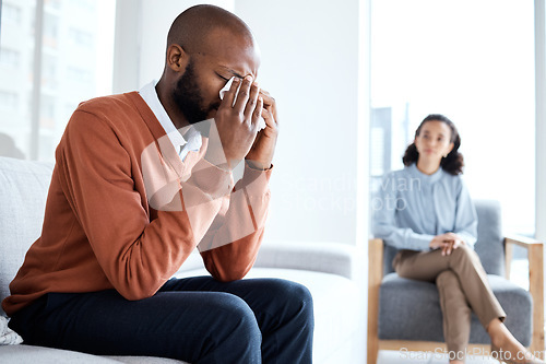 Image of Crying, depression and black man for psychologist help, support and services of patient mental health. Counseling, psychology and USA therapy, therapist woman consulting client depressed, sad or fear