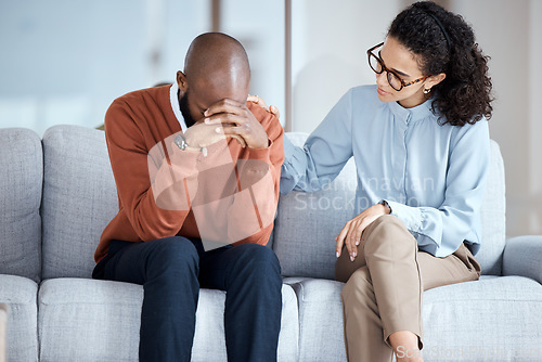 Image of Sad, depression and black man with psychologist help, support and empathy for mental health crying. Counseling, psychology and USA professional woman consulting depressed patient or client problem