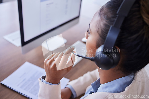 Image of Woman, call center and computer in telemarketing or desktop support for communication at office. Female consultant or agent with headset mic for online advice or consulting assistance at workplace