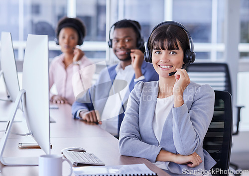 Image of People, call center and portrait smile for telemarketing, customer support or service at the office. Group of consultants smiling with headset in CRM agency for online advice or help in contact us