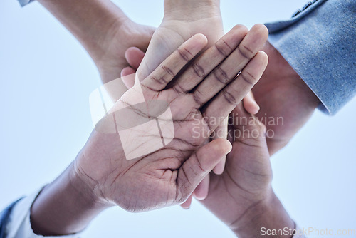 Image of People, trust and hands together below for community, unity or team agreement in support for collaboration. Hand of group in teamwork, motivation or coordination for win or partnership in solidarity