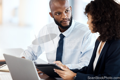 Image of Executive planning, black man and meeting with team, technology and strategy review in office. Financial advisor, investment management and corporate leader listen to feedback of business accounting