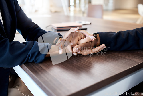 Image of Love, comfort and hands of couple in support of bad news, cancer or diagnosis at a table, unity and trust. Hand, holding empathy by woman with man for depression, prayer and kindness during crisis