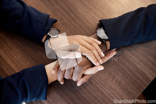 Image of Couple, love and above hands of comfort in support of bad news, cancer or diagnosis at table, unity or trust. Hand, holding empathy by woman with man for depression, prayer and kindness during crisis