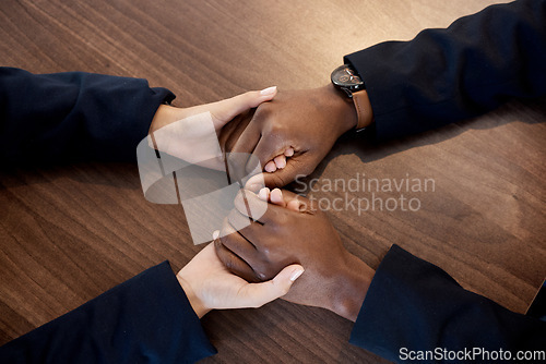 Image of Couple, above and hands of comfort in support of bad news, cancer or diagnosis above a table, unity and trust. Hand, holding empathy by woman with man for depression, prayer or kindness during crisis