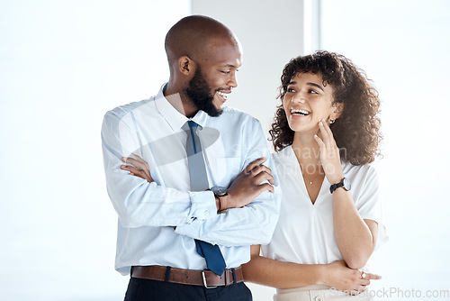 Image of Laughing, arms crossed and employees with pride, confidence and diversity at corporate company. Success, happy and black man and woman smiling for business solidarity and support for a collaboration