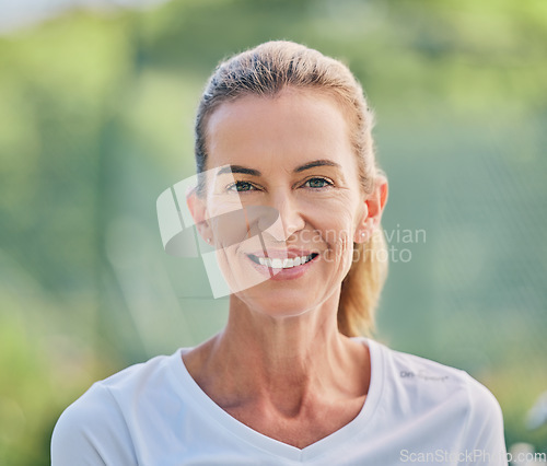 Image of Happy, sports and portrait of a woman in tennis for training, fitness and cardio competition on a court in France. Motivation, exercise and face of a mature sport player standing for a match