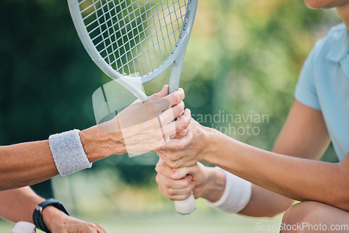 Image of Hands together, tennis racket and coach with woman athlete, support and helping hand at training. Women, coaching and learning for sports, goals and motivation by blurred background outdoor for goal