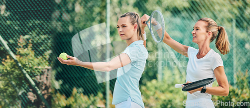 Image of Tennis training, sport and women together on outdoor turf, instructor or coach with fitness, motivation and help. Exercise, sports lesson and athlete workout, teaching and learning skill on court