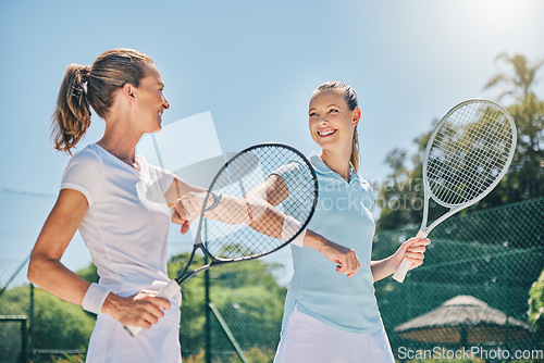 Image of Tennis, women and sports elbow greeting outdoor on court for fitness exercise and training for competition. Happy friends team at club for game, workout and performance for wellness with motivation