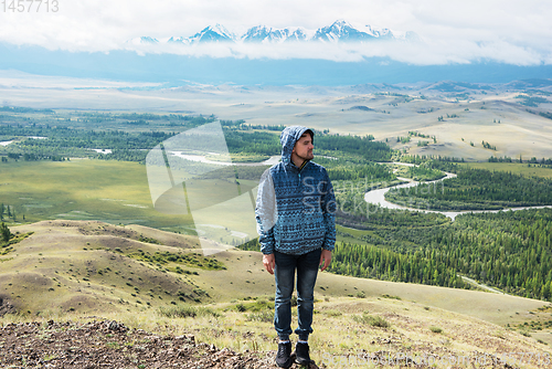 Image of Relaxing man in Kurai steppe on North-Chui ridge