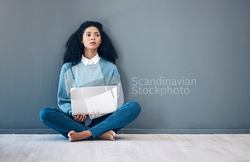 Image of Laptop, relax and thinking with black woman on floor and wall mockup for social media, news or website. Design, online shopping and technology with girl for communication, internet or advertising