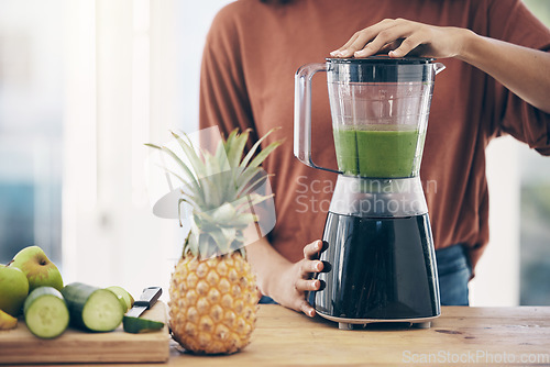 Image of Blender, green smoothie and woman hands for diet, detox and healthy morning breakfast in kitchen with fruit. Vegetables, food and young person or nutritionist with nutrition drink for vegan protein