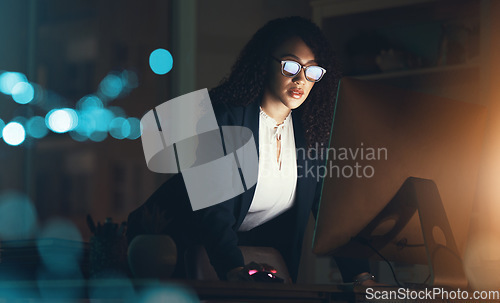 Image of Business, night and black woman on computer at desk for project, strategy report and reading email. Corporate manager, dark office and female standing done working on schedule, planning and research
