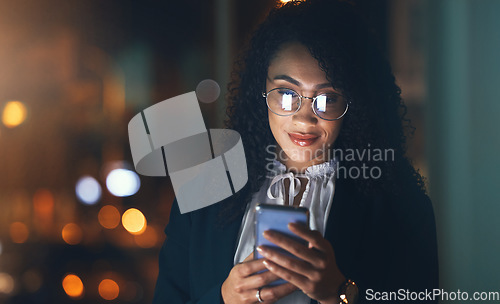 Image of Email, online and woman reading on a phone, communication and internet for business at night. Connection, social media and employee with a mobile in a dark office for the web, networking and overtime