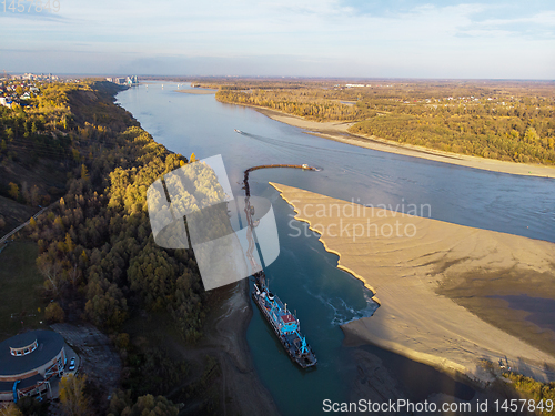 Image of barge in the working river