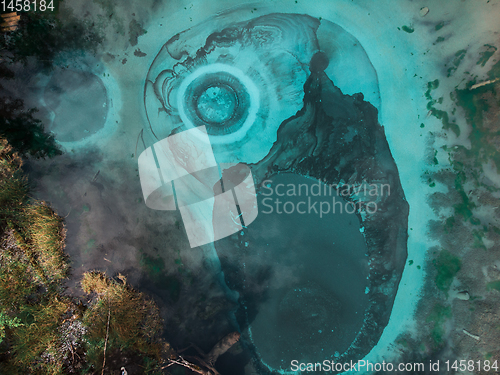 Image of Geyser (blue, silver) lake with thermal springs