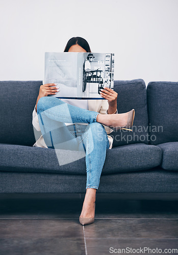 Image of Relax, magazine or girl reading newspaper articles on sofa at home for information or story updates. Press, focus or woman relaxing and studying abstract art for knowledge in a publication on couch