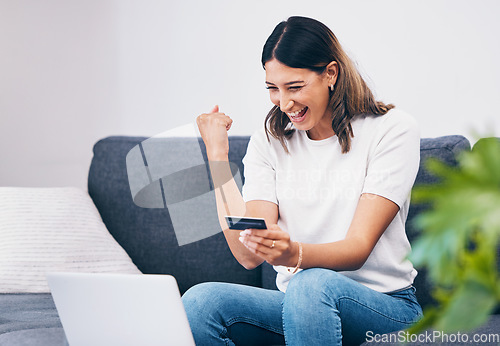 Image of Success, laptop or woman excited with credit card or digital payment in celebration on sofa at home. Wow, finance or happy girl celebrates online shopping subscription discount, sales offer or deal