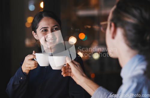 Image of Business people, night and office with coffee cup together for toast, motivation and energy for project. Businessman, woman and drink for celebration, team building and success in dark workplace