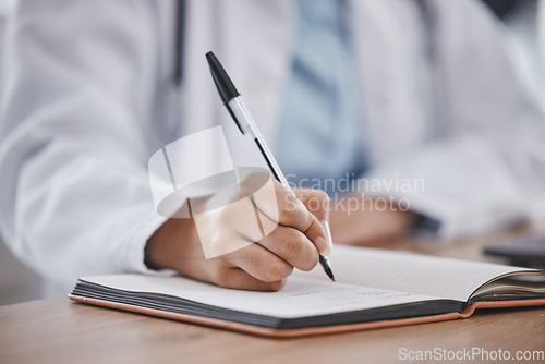 Image of Writing, book and notebook by doctor or healthcare professional with a prescription or making notes in an office. Hand, closeup and medical worker or employee in compliance with schedule
