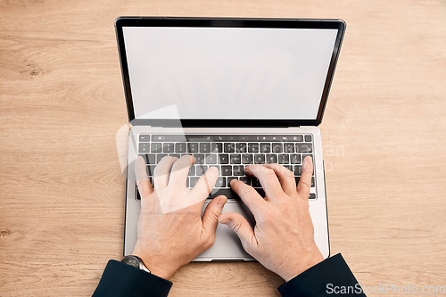 Image of Hands, laptop and typing with screen mockup above for advertising, communication or marketing. Top view hand of person working on computer display for email, advertisement or branding on wooden table