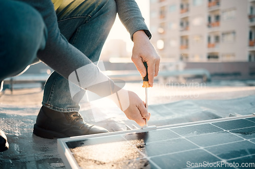 Image of Solar panel, screwdriver and worker hands with tools for renewable energy and electricity. Sustainable innovation, roof work and engineering employ install eco friendly and sustainability product